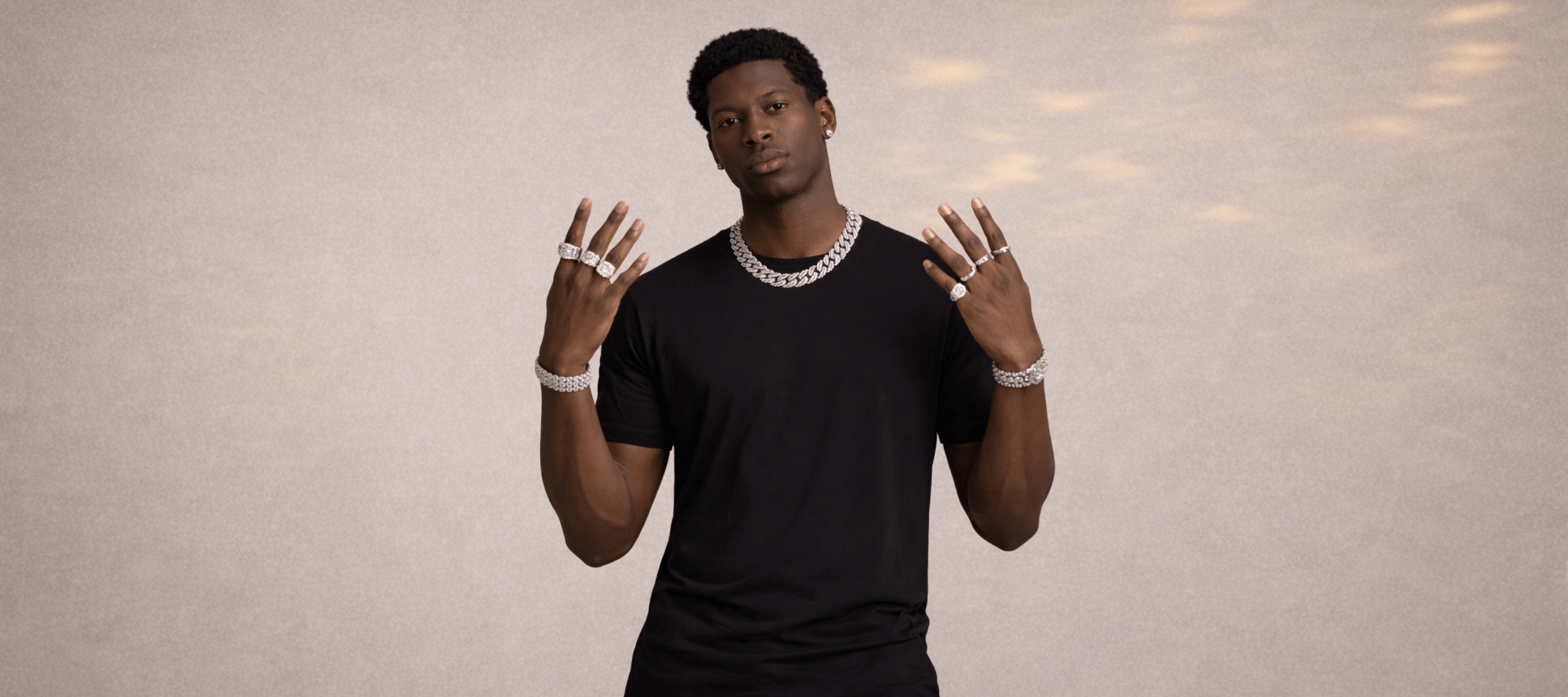 Three fashion models wearing Ultimate Bold luxury jewelry including tennis chains, heavy necklaces, and silk scarf in a premium storefront hero banner